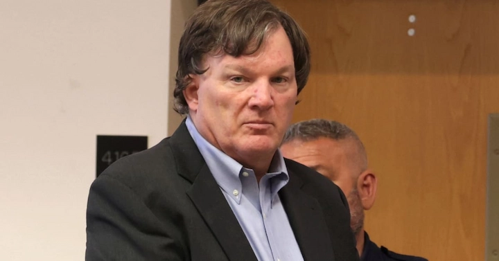 Rex Heuermann in a black blazer during a court appearance, related to his 2025 net worth and case.