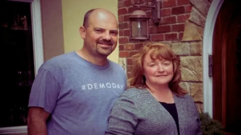 Bart and Krista Halderson smiling outside their home in Windsor, Wisconsin, before their tragic deaths.