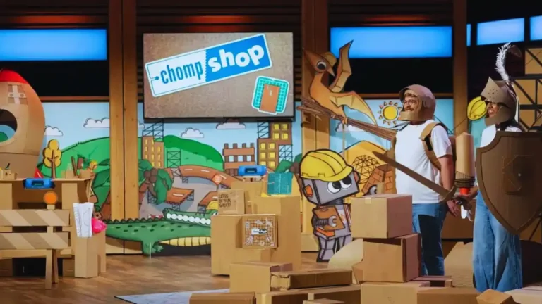 Chomp Shop Shark Tank pitch with founders in creative cardboard costumes on colorful stage.