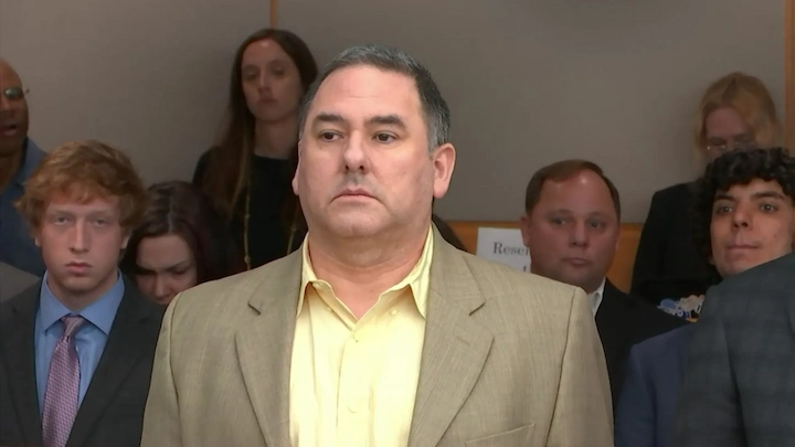 Darrin Lopez standing in court after being found guilty in the Jamie Faith murder trial in Dallas.