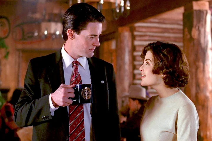 FBI agent Dale Cooper and Audrey Horne share a moment in the Twin Peaks diner.
