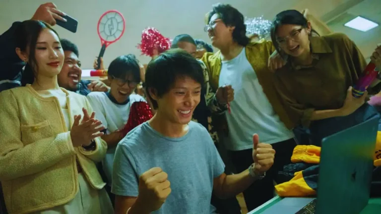 Team celebrates Thunder Express victory in Mad Unicorn series scene.