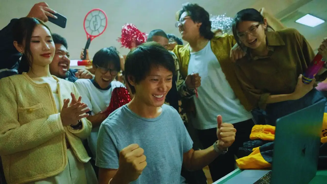 Team celebrates Thunder Express victory in Mad Unicorn series scene.