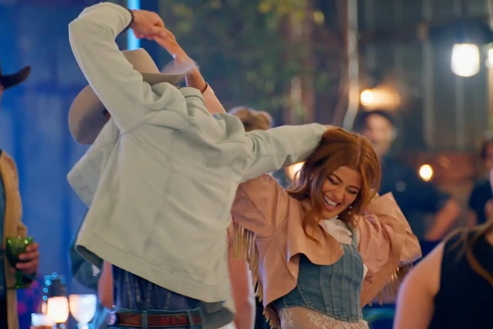 Keeley Goldberg dancing with Farmer Colton Hendricks during a joyful moment on the show