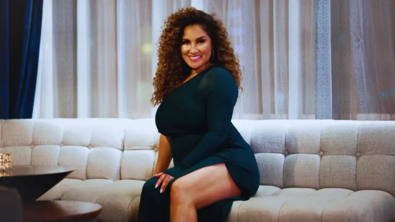 Spicy Mari giving relationship advice on a dating reality show set, highlighting her coaching role on Sneaky Links.