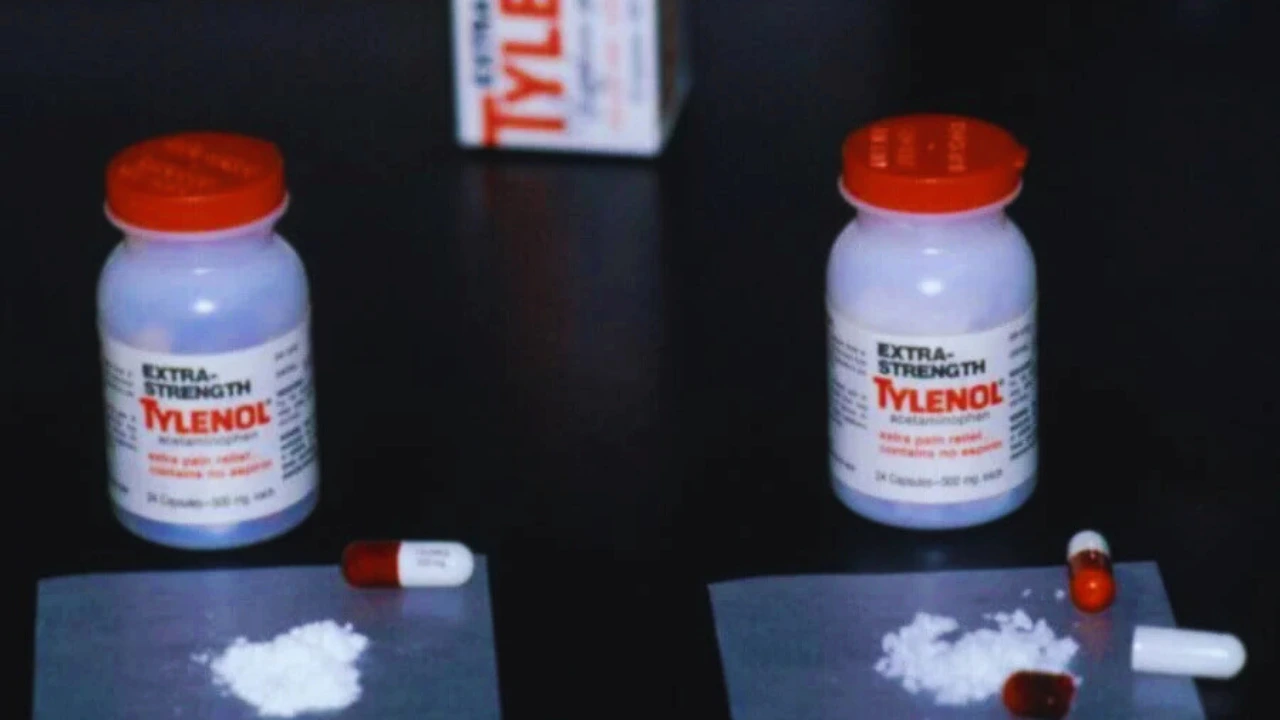 Two bottles of Extra Strength Tylenol with exposed capsules and white powder from the 1982 poisoning case.