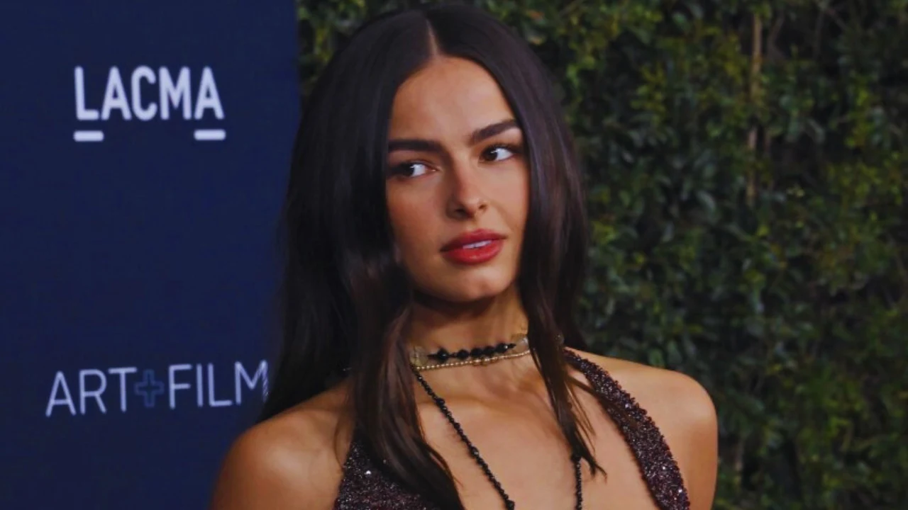 Addison Rae on LACMA Art + Film red carpet wearing a glittering gown and layered necklaces.