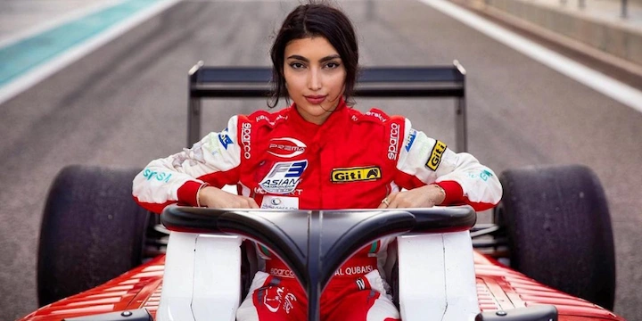 Amna Al Qubaisi in white racing suit beside graphic about her 2025 net worth and racing career