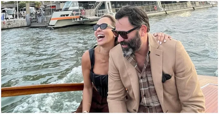Anthony Lopez and wife smiling on a boat, enjoying family life and net worth success in 2025