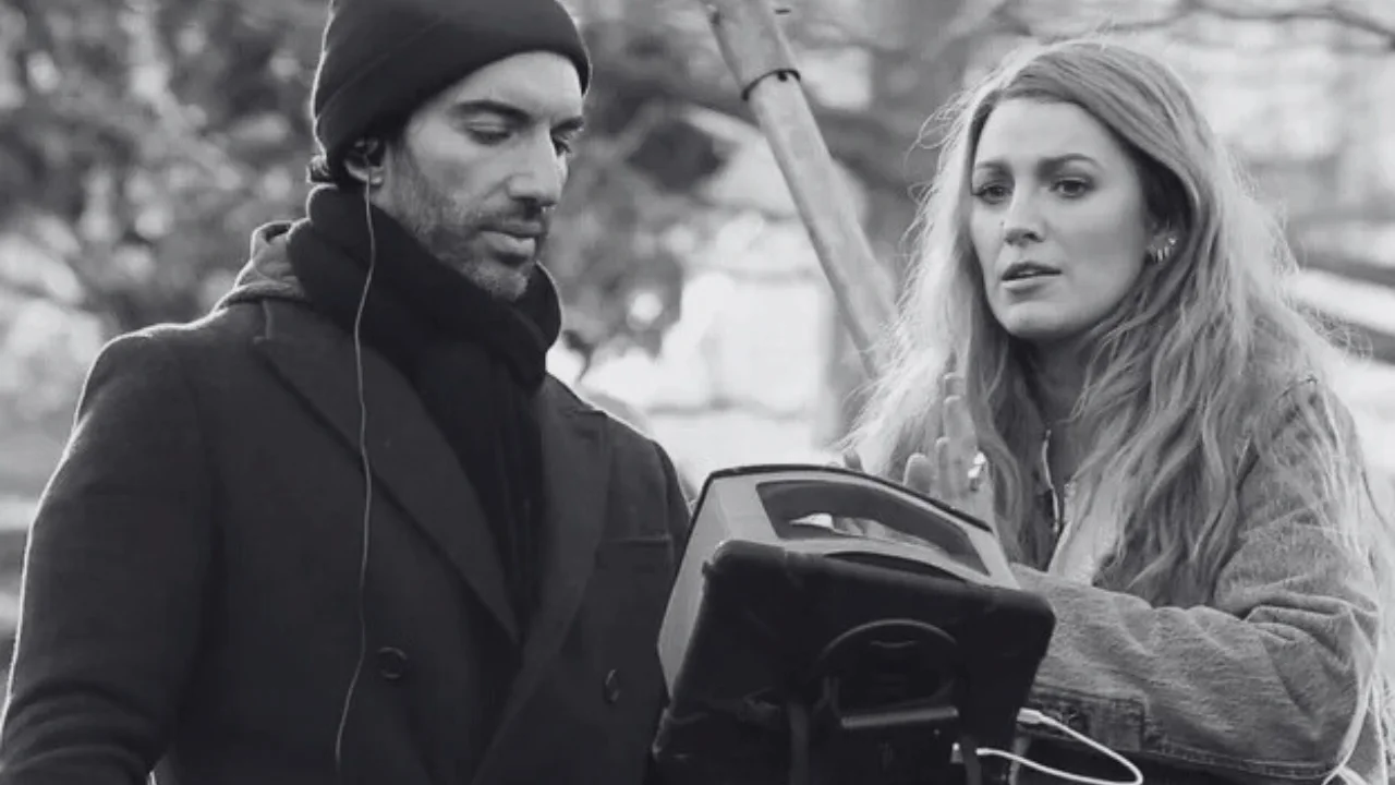 Blake Lively and Justin Baldoni reviewing scene on It Ends With Us movie set.