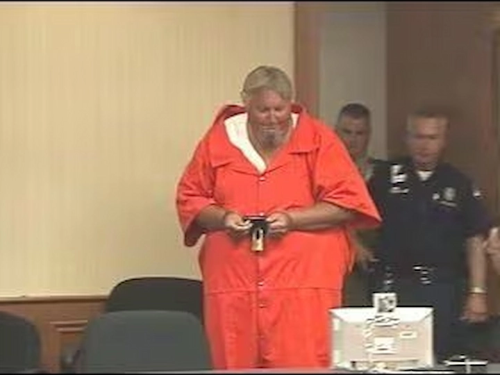 Billy Fields in orange prison jumpsuit during court appearance for Corinna Mullen murder trial.