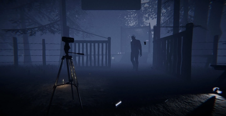 Phasmophobia gameplay scene with shadowy ghost figure and camera in haunted forest.