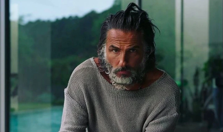 Ilan Tobianah with silver beard wearing gray sweater, showcasing personal style and Net Worth 2025