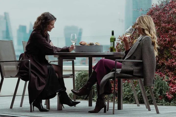 Alice and Jan sharing a drink in MobLand, rooftop meeting pivotal to Harrigan crime storyline.