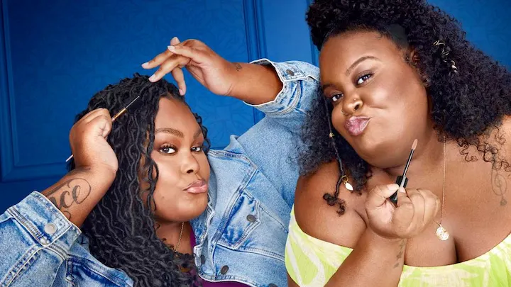 Jaz and Nesha playfully posing with makeup brushes, promoting body positivity and 1000-Lb Roomies.