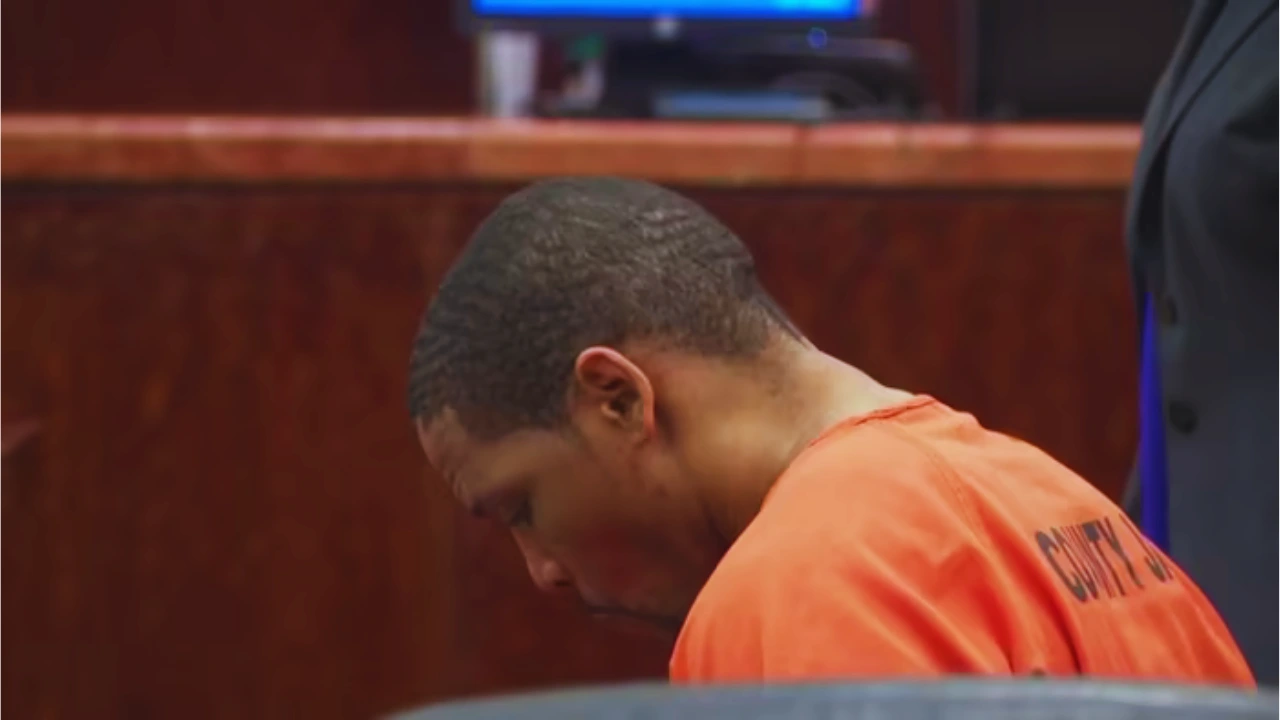 Karim Zakikhani in orange jumpsuit during court sentencing for knowingly infecting with HIV.
