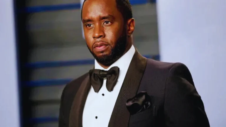 Sean Combs in black tuxedo and bow tie at formal event.