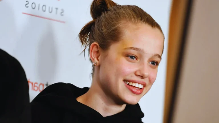 Shiloh Jolie smiles at a public event, debuting her new identity as Shi in choreography.