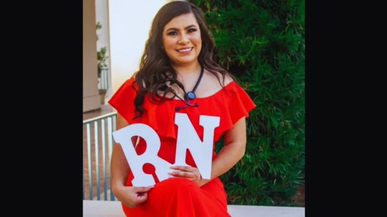 Sofia Santana in red dress holding RN letters, symbolizing her registered nurse graduation moment.