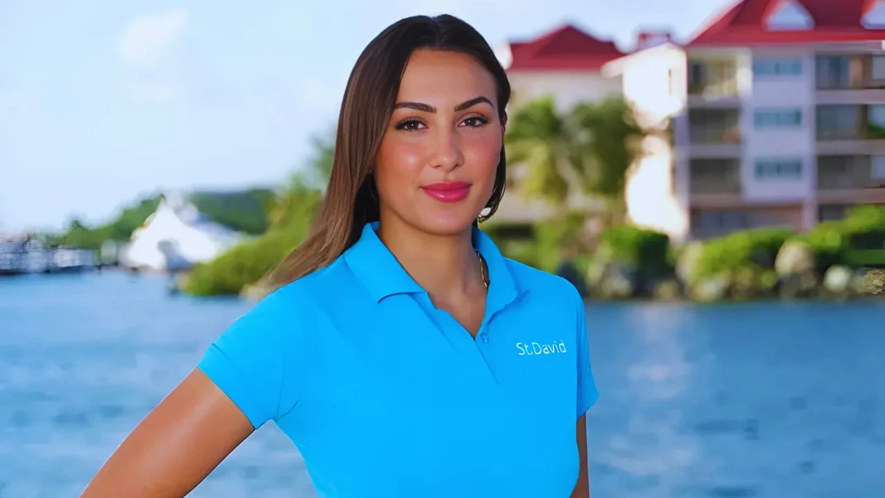 Solène Favreau in St. David crew uniform posing outdoors from Below Deck Season 12.